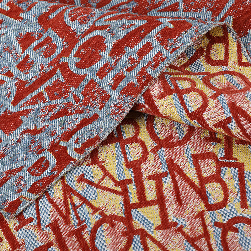 Tecido jacquard vermelho forte à prova d'água com estampa de letras elegantes